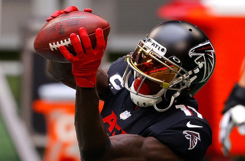 A picture containing person, player, helmet
Description automatically generated