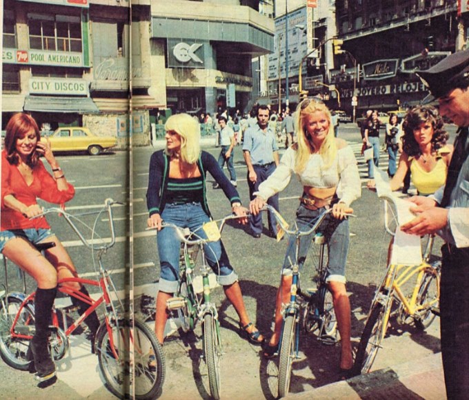 A group of people riding bikes

Description automatically generated with medium confidence