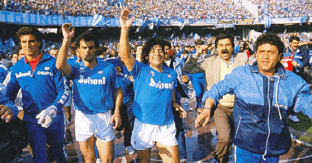 A picture containing person, sport, group, standing

Description automatically generated